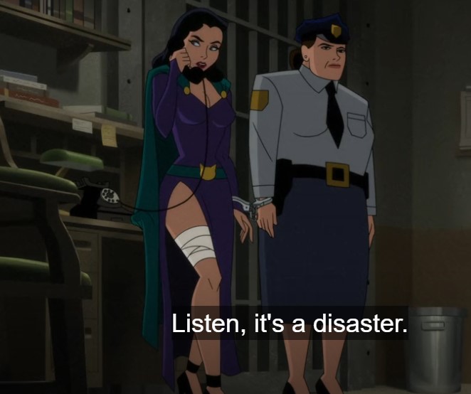 bcc episode 3 catwoman cuffed to a cop.jpg