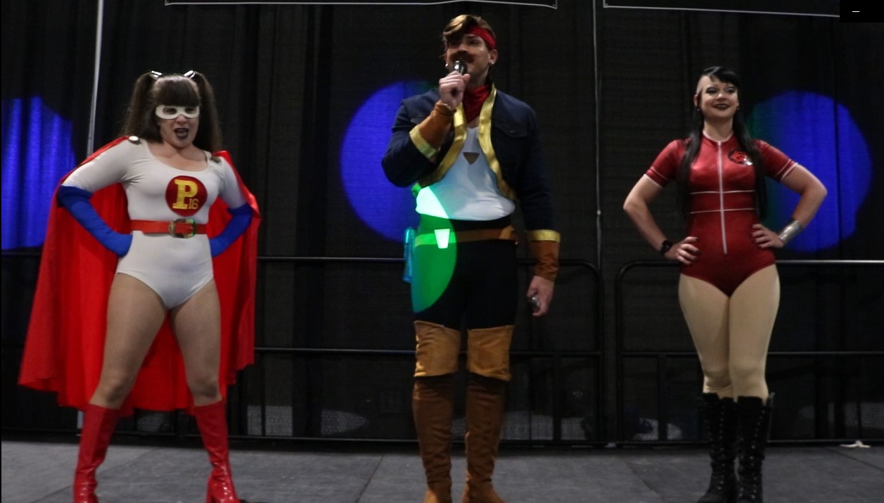 red gina and poderosa on stage cosplay world.jpg