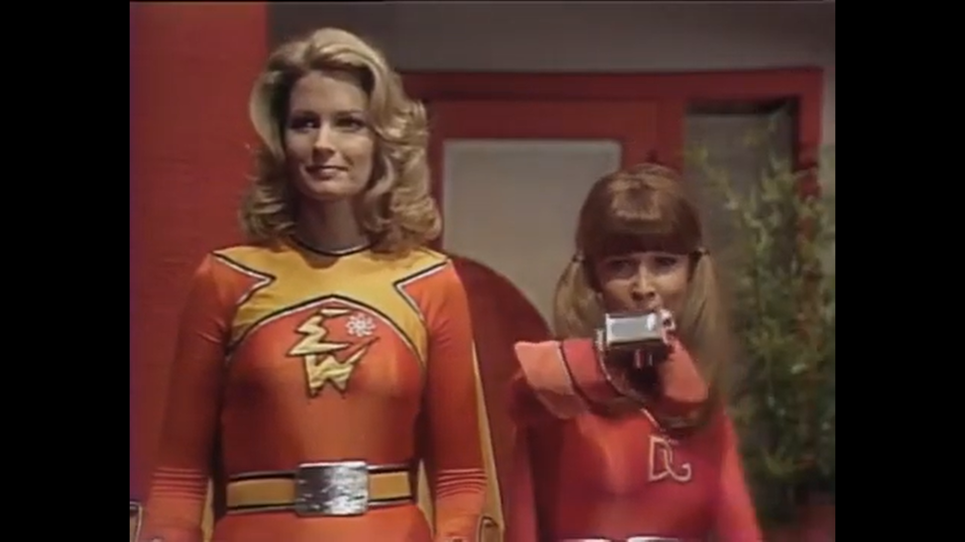 Dyna Girl jumps Into Action, Electra Woman Watches.png