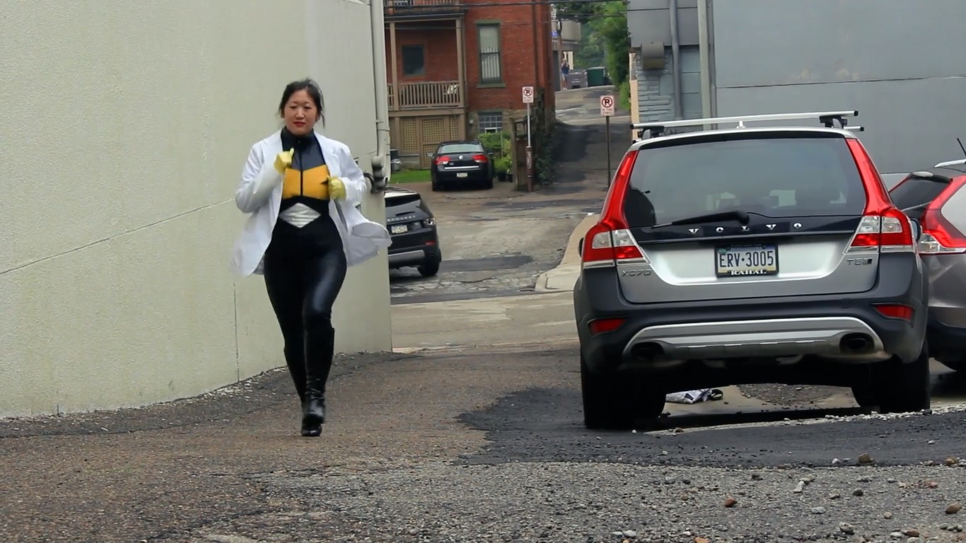 kim runs in her power suit.jpg